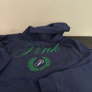 Blue Hoodie with Green and White Logo